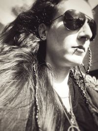 Close-up portrait of young woman looking away