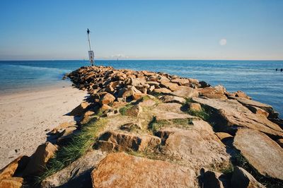 Scenic view of sea against clear sky