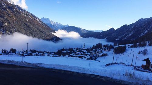 Scenic view of snow covered mountains