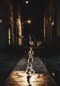 Illuminated street light at night