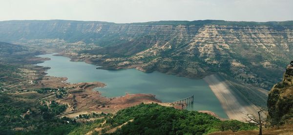 High angle view of river flowing through mountains