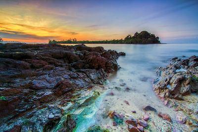 Scenic view of sea against sky during sunset