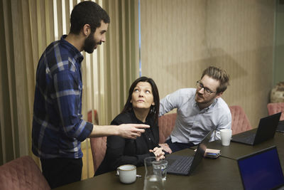 People talking during business meeting