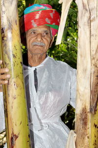 Portrait of man standing outdoors