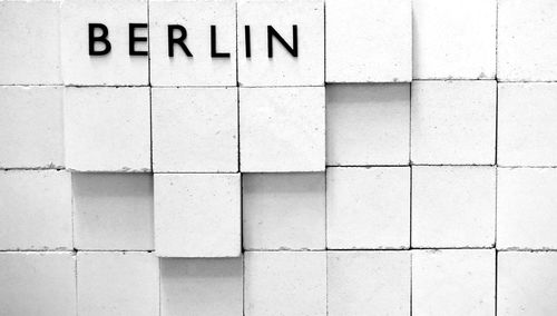 Close-up of berlin text on white blocks