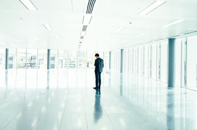 People standing in corridor