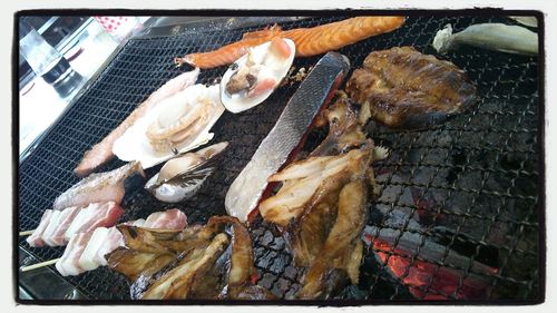Close-up of fish on grill