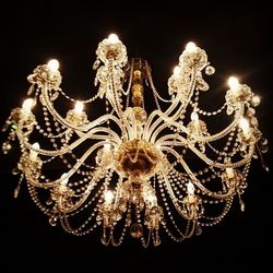 Low angle view of illuminated chandelier