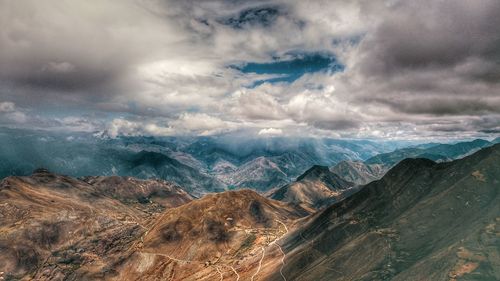 Aerial view of dramatic landscape against sky