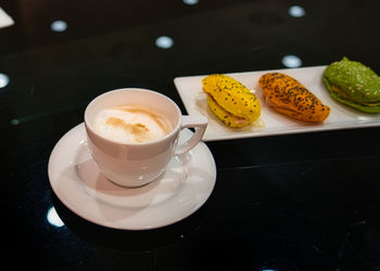 Close-up of coffee served on table