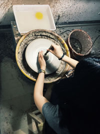 High angle view of woman preparing food