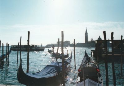 Boats moored in sea