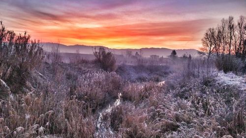 Panoramic view of landscape against sky during sunset