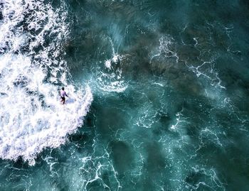 High angle view of people in sea