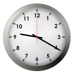 Close-up of clock over white background