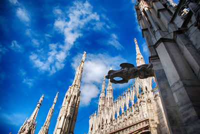 Low angle view of statue against cloudy sky