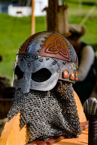 Close-up of traditional helmet on table