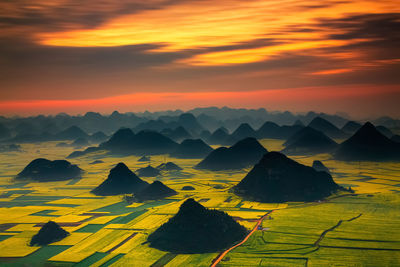 Aerial view of dramatic landscape during sunset