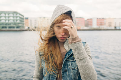 Young red haired woman sightseeing