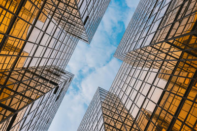 Low angle view of modern buildings against sky