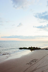 Scenic view of beach against sky