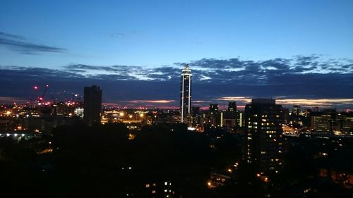 Illuminated cityscape at night