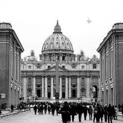 Group of people in front of building in city