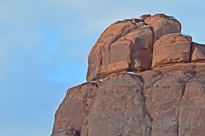 Low angle view of statue against sky