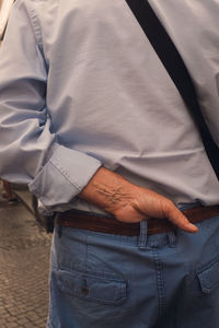 Rear view of man standing outdoors