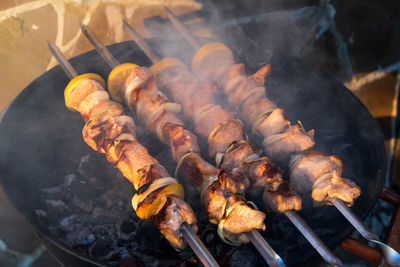 Close-up of meat on barbecue grill