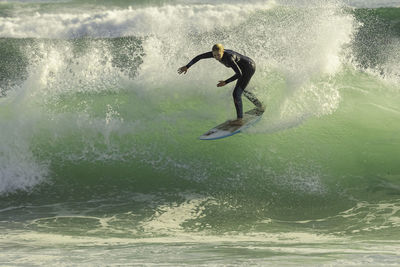 Man surfing in sea