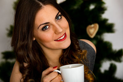 Portrait of a woman drinking coffee