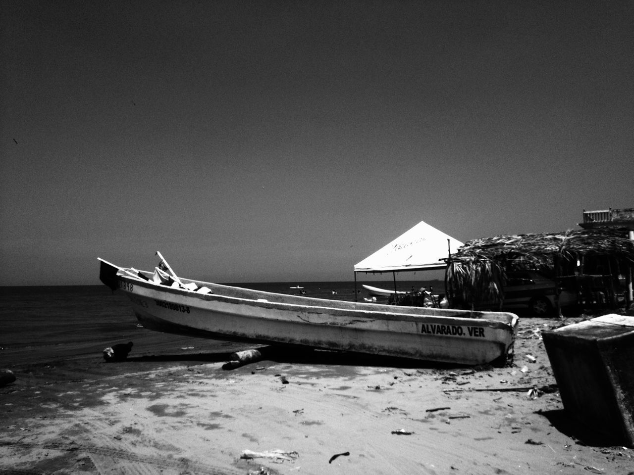 nautical vessel, boat, transportation, sea, mode of transport, moored, water, beach, clear sky, copy space, shore, sand, travel, nature, tranquility, horizon over water, tranquil scene, outdoors, sky, day