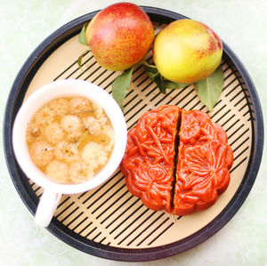 High angle view of fruits in plate on table