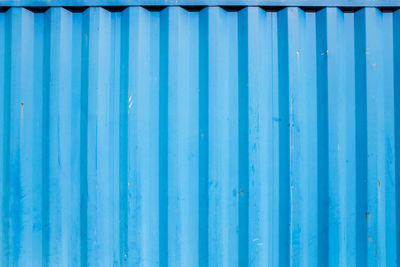 Full frame shot of blue cargo container