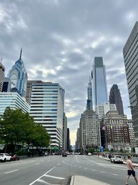 Modern buildings in city against sky