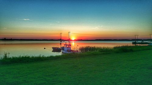 Scenic view of sunset over river