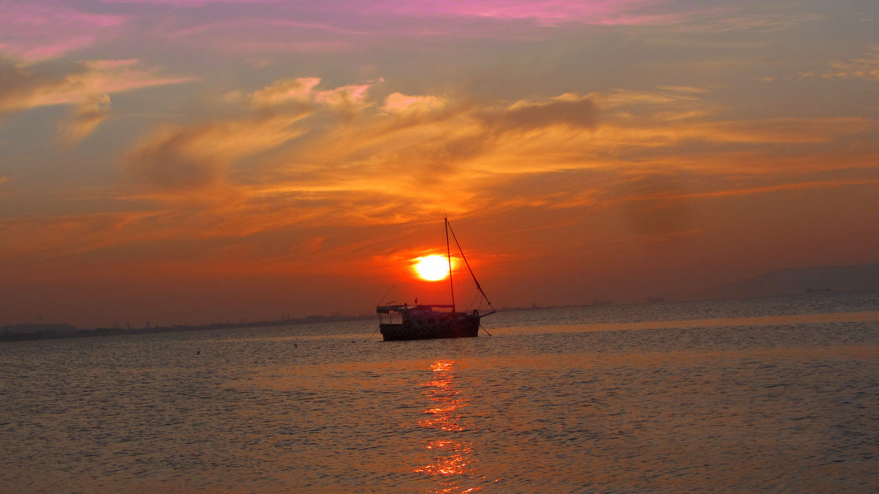 sunset, water, sea, nautical vessel, transportation, boat, mode of transport, sun, sky, orange color, horizon over water, scenics, tranquility, tranquil scene, beauty in nature, reflection, waterfront, idyllic, silhouette, nature