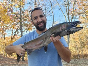 Portrait of man holding fish