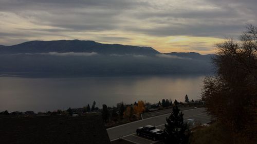 Scenic view of lake against sky during sunset