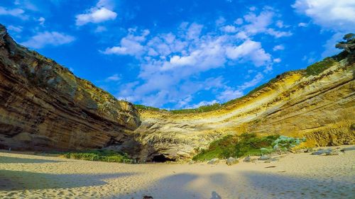 Panoramic view of landscape against cloudy sky