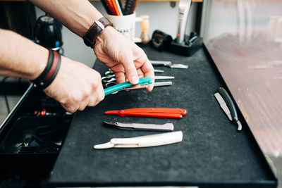 Close-up of man working on table