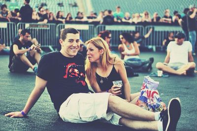 Woman playing with arms raised