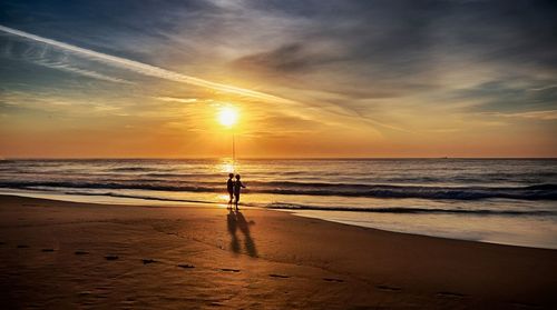 Scenic view of sea at sunset