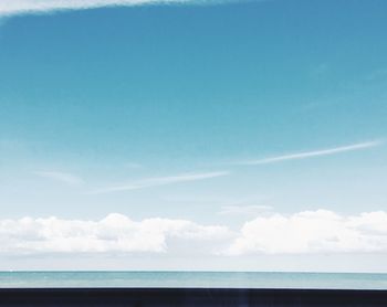 Scenic view of sea against blue sky