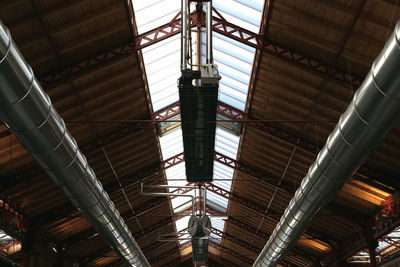 Low angle view of illuminated ceiling at railroad station