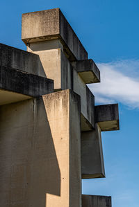 Low angle view of building against blue sky