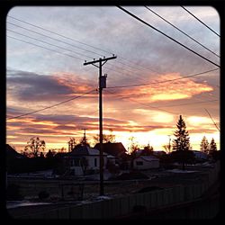 Electricity pylon at sunset