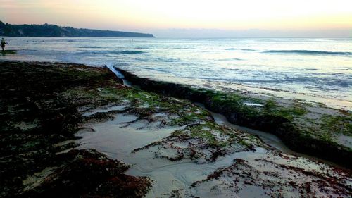 Scenic view of sea at sunset