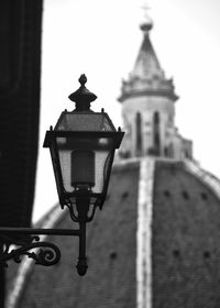 Low angle view of bell tower against sky